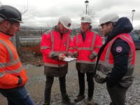 Charles Brand Team carry out litter pick along the River Lagan