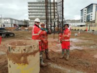 FK Lowry staff installing cages