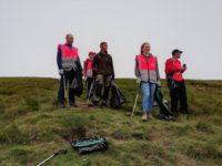 The volunteer team take in the views