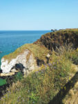 Magheracross Viewpoint visible in the distance