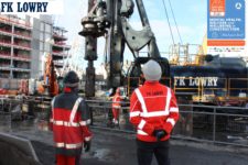 FK Lowry staff look up at the Piling Rig